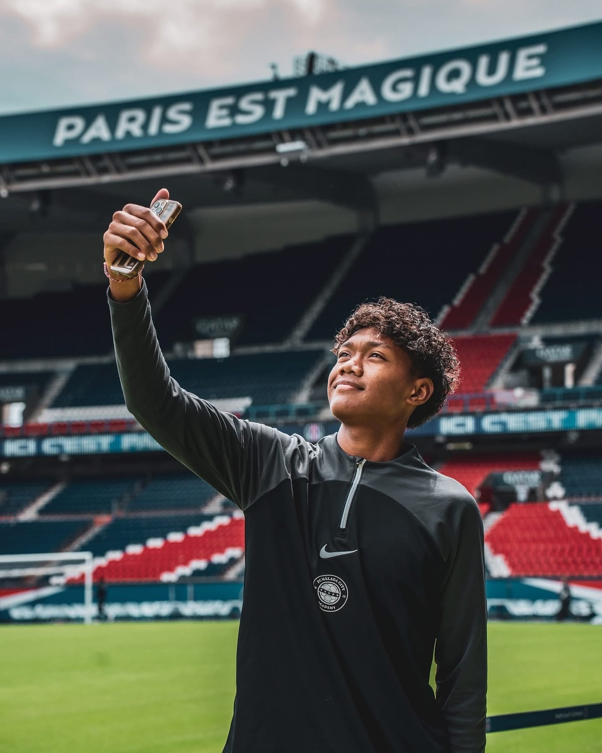Malaga FC Academy trip to PSG in stadium taking selfie