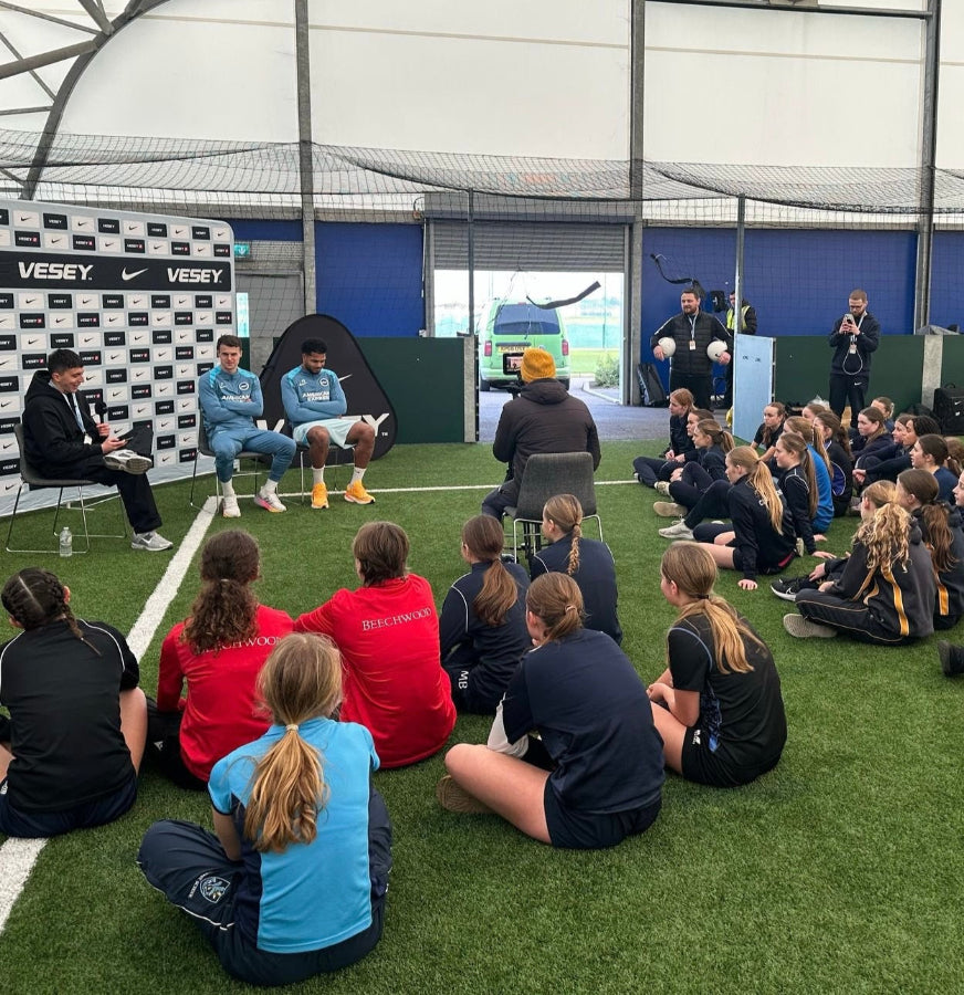 Elite Football Coached speaking to Independent school students at Manchester City Training facilities